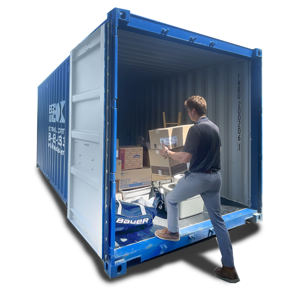 A man loading boxes into Big Blue Boxes