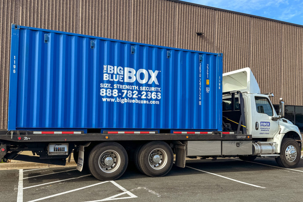 A Big Blue Box container on a truck